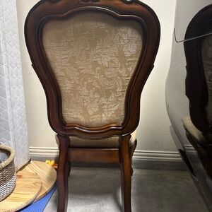 Elegant Brown Wooden Chair with Cream Upholstery